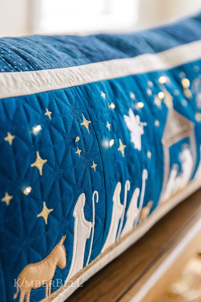 https://www.whistlebearquilts.com/cdn/shop/files/KDKB1279-Nativity-Bench-Pillow-Webres-18.jpg?v=1690150275&width=1445