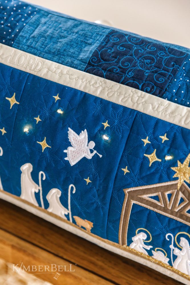 https://www.whistlebearquilts.com/cdn/shop/files/KDKB1279-Nativity-Bench-Pillow-Webres-19.jpg?v=1690150276&width=1445